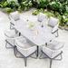Bayou Breeze Ammadis Rectangular 6 Person 62.99" Aluminum Outdoor Dining Set w/ Cushions Stone/Concrete/Metal in Black/Gray | 62.99 W x 35.43 D in | Wayfair