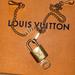 Louis Vuitton Accessories | Authentic Louis Vuitton Lock And Key With Chain Bag Charm | Color: Gold | Size: Os