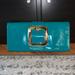 Michael Kors Bags | Michael Kors Teal And Gold Patent Leather Buckle Clutch | Color: Blue/Gold | Size: Os