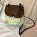 Dooney & Bourke Bags | Dooney & Bourke Alto Crossbody Leather Nylon Saddle Bag | Color: Brown/Yellow | Size: Os