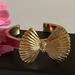 Lilly Pulitzer Jewelry | Lilly Pulitzer Gold Bow Pink Enamel Band Cuff Bracelet Rhinestone 2” Diameter | Color: Gold/Pink | Size: 2.5” Diameter