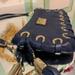 Michael Kors Bags | Michael Kors Navy Leather Astor Grommet Tassel Clutch Convertible Shoulder Bag | Color: Blue/Gold | Size: Length 10 ,High 5.2