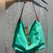 Dooney & Bourke Bags | Dooney & Bourke Aqua /Mint Medium Logo Lock Nylon Hobo Shoulder Bag | Color: Blue | Size: Os