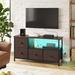 Ebern Designs Ojaswi TV Stand for TVs up to 40"with Charging Station & LED Lights, 4 Drawer Storage Chest in Brown | Wayfair