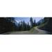 Panoramic Images Empty road passing through mountains Bernese Oberland Switzerland Poster Print by Panoramic Images - 36 x 12