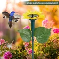 Piquet de jardin de pelouse de colibri papillon flottant plantes solaires fleurs de cour