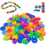 Besaitung perlen kreative Kinder Kind Feinmotorik Handarbeit geometrische Einfädeln Puzzle