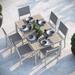 Travira 7-Piece 63" Rectangular Dining Table, Armchairs, and Side Chairs Set - Vintage Tekwood