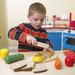 Melissa & Doug 31 Piece Play Food Set Solid Wood in Brown/Red/Yellow | 11.4 H x 10.8 W x 2.5 D in | Wayfair 487