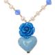 'Floral and Heart-Themed Gold-Accented Blue Pendant Necklace'