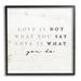 Stupell Industries Love Is What You Do Phrase Framed On Wood Graphic Art Wood in Brown/White | 17 H x 17 W x 1.5 D in | Wayfair ax-313_fr_17x17