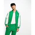 adidas Originals Superstar trackjacket in green and white