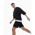 ASOS DESIGN tracksuit with oversized short sleeve hoodie & slim shorts in black