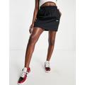 Nike Essential woven high waisted skirt in black