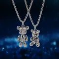 Collana girevole con ciondolo bambola orso Collana in acciaio inossidabile per uomini e donne Personalità hip-hop Semplice catena di maglione di cartoni animati all'ingrosso