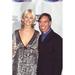 Gretha Cavazzoni In Silver And Sheer Dress & Tommy Hilfiger In Blue Pinstripe Suit Vh1 Fashion Awards Photo Print (16 x 20) - Item # CPA2527