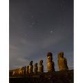 Moai stand at night illuminated beneath a sky full of stars on Easter Island at Tongariki site Chile; Easter Island Isla de Pascua Chile Poster Print by Michael Melford (12 x 16)