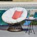 Claborn Dark Brown Swivel Papasan Wicker Indoor/Outdoor Moon Chair with Beige/ Orange Cushion, by Thy-Hom - 9' x 12'