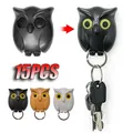 Owl magnetic key hook Automatic winking no-punch hook Doorway entrance living room wall hanging