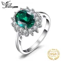 JewelryPalace Princess Diana Simulated Green Emerald Created Red Ruby Halo Engagement Ring 925