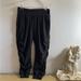 Athleta Pants & Jumpsuits | Athleta Women's Size 4 Black Side Ruffle Attitude Pants | Color: Black | Size: 4