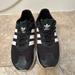 Adidas Shoes | Adidas Black And White Stripe Tennis Shoes | Color: Black | Size: 9.5