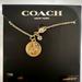 Coach Accessories | Coach New York Nwt Leo Zodiac Necklace | Color: Gold | Size: Length 16” + 2”