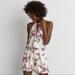 American Eagle Outfitters Pants & Jumpsuits | Aeo Floral Halter Romper - Xs | Color: Cream/Purple | Size: Xs