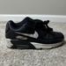 Nike Shoes | Black And White Nike Leather Air Max Shoes Size 4 (Boys) | Color: Black/White | Size: 4b