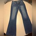 American Eagle Outfitters Jeans | American Eagle Flared Leg Super Stretch Jeans. Dark Denim. Size 4 Short. | Color: Red | Size: 4