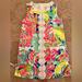 Lilly Pulitzer Dresses | Girls Lilly Pulitzer Floral Dress With Ties On The Sides Sz 7 | Color: Blue/Pink | Size: 7g