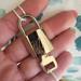 Louis Vuitton Jewelry | - Silver Louis Vuitton Padlock Only Paired W/ Sterling Silver Chain | Color: Gold/Red/Silver | Size: Os