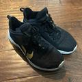 Nike Shoes | Black And Gold Nike Cross-Trainers | Color: Black/Gold | Size: 9.5