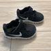 Nike Shoes | Baby/Toddler Black And White Nike Free 5.0 Size 4c | Color: Black/White | Size: 4bb