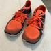 Nike Shoes | Nike Brand Tennis Shoes. Size 9. Gently Worn. Brand Is Nike Free. | Color: Gray/Orange | Size: 9