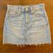 Madewell Skirts | Madewell Light Denim Mini Skirt Size 25 Xs Frayed Accent Hem With Back Pockets | Color: Blue | Size: Xs