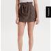 American Eagle Outfitters Skirts | American Eagle Cheetah Leopard Print Paperbag Tie Waist Mini Skirt Brown Small | Color: Black/Brown | Size: S