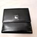 Dooney & Bourke Accessories | Dooney & Bourke Vintage Black Leather Bifold With 8 Card Slots And 2 Bill Folds | Color: Black | Size: 4 X 4 Approximately Closed