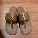 Tory Burch Shoes | Last Pair Tory Burch Leather Tan T Thong Gold Emblem Sandals Sz 7.5 New | Color: Gold/Tan | Size: 7.5
