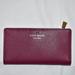 Kate Spade Bags | Kate Spade New York Wine Colored Bifold Leather Wallet | Color: Gold/Red | Size: Os