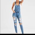 American Eagle Outfitters Pants & Jumpsuits | American Eagle Medium Wash Next Level Stretch Overalls Jeggings Size | Color: Blue | Size: 00j