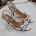 Kate Spade Shoes | Kate Spade Ny Women's Ankle Strappy Knot Sandal Size Us 7b White & Gold Euc | Color: Gold/White | Size: 7