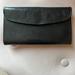 Coach Accessories | Black Leather Coach Wallet - Still In Good Use Condition | Color: Black | Size: Os