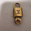 Louis Vuitton Accessories | Louis Vuitton Lock And Key 318 | Color: Black/Gold | Size: Os