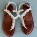 Jessica Simpson Shoes | Jessica Simpson Riel Flower Detail Flat Sandals, Size 6 | Color: White | Size: 6