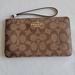 Coach Bags | Coach Large Wristlet | Color: Brown/Tan | Size: Os