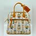 Dooney & Bourke Bags | Disney Parks 2022 Pinocchio Figaro Cat And Cleo Satchel Bag Dooney & Bourke Nwt! | Color: Cream/Yellow | Size: Os