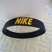 Nike Accessories | Nike Black Bracelet Men Teen Boys Bangle Rubber Bracelets Yellow Letters | Color: Black/Gold | Size: Os