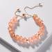 Anthropologie Jewelry | 2/$35 Anthropologie Gold Plated Frosted Peach Beaded Adjustable Bracele | Color: Orange/Pink | Size: Adjustable