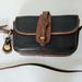 Dooney & Bourke Bags | Dooney And Bourke Crossbody Bag Black | Color: Black/Tan | Size: Os